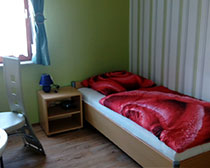 Ansicht WG-Zimmer Bett